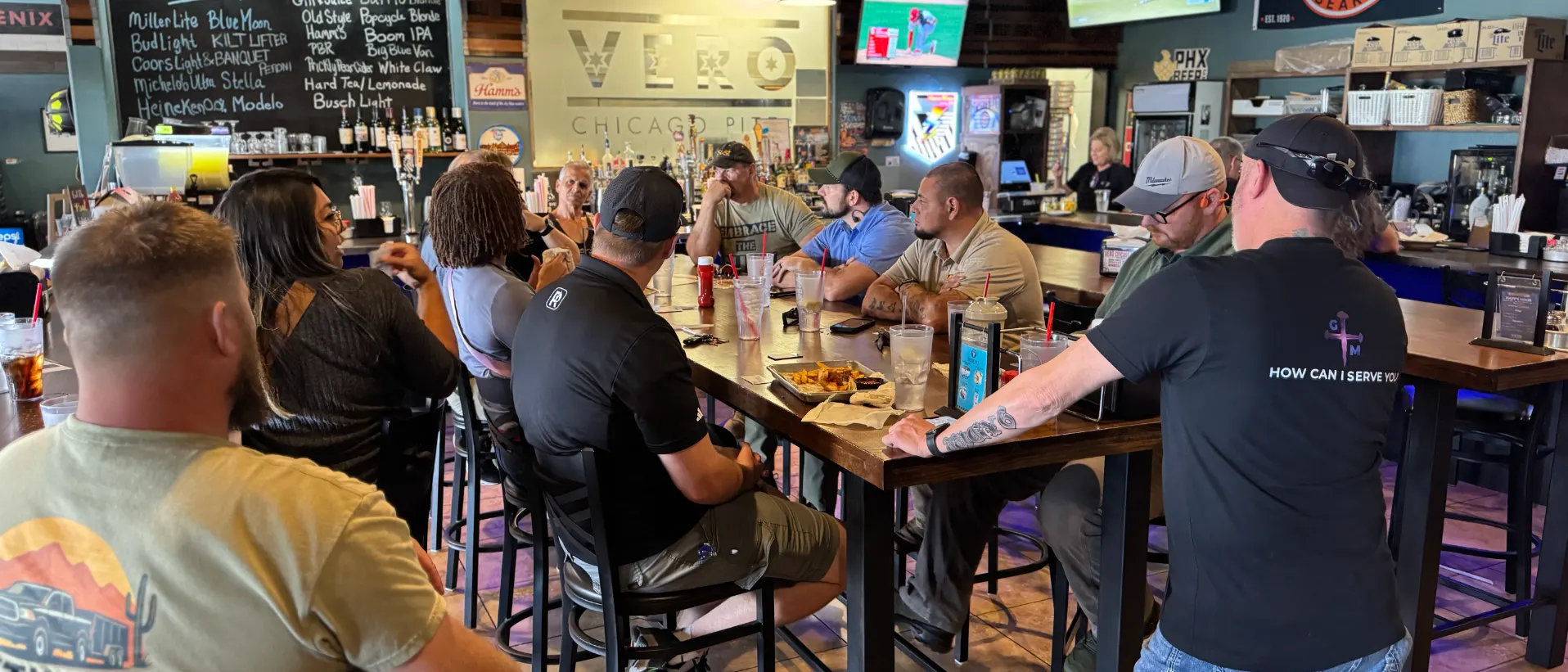 TPC San Tan Valley Trusted Team members meeting over lunch at Vero Chicago Pizza